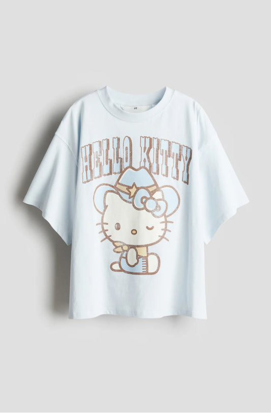 Camisa azul celeste Hello Kitty niña H&M