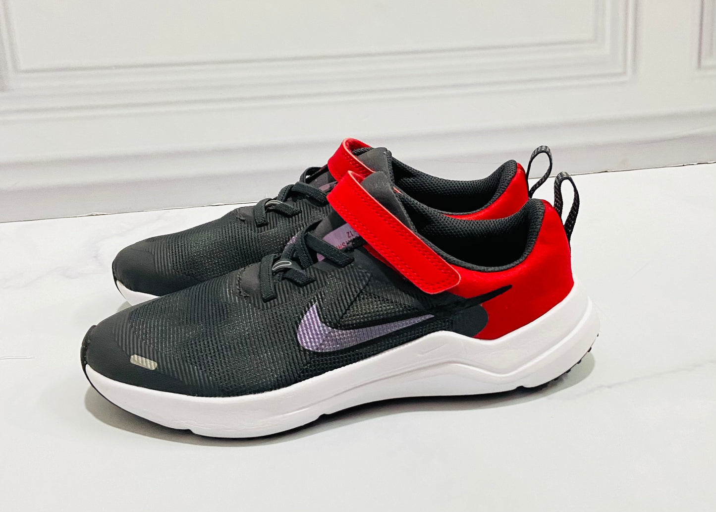Tenis Nike negros niño niña unisex