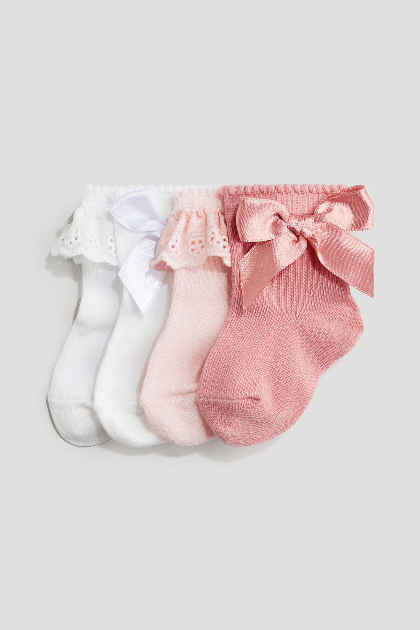 Set 4 calcetines rosados blancos chongos bebe niña H&M 1123215027