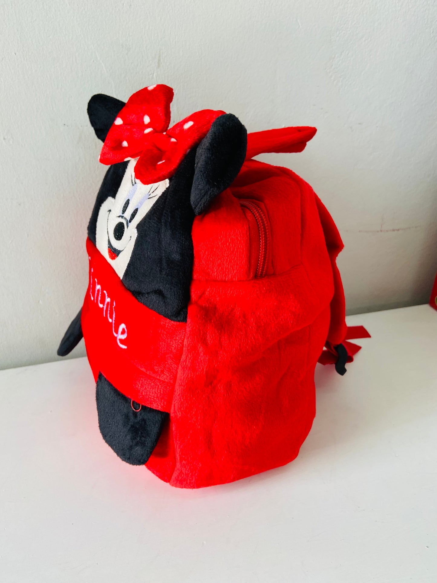 Mochila roja Minnie promo 4x1000
