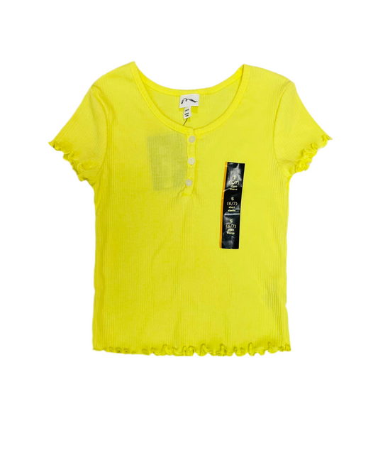 Camisa amarilla niña art class