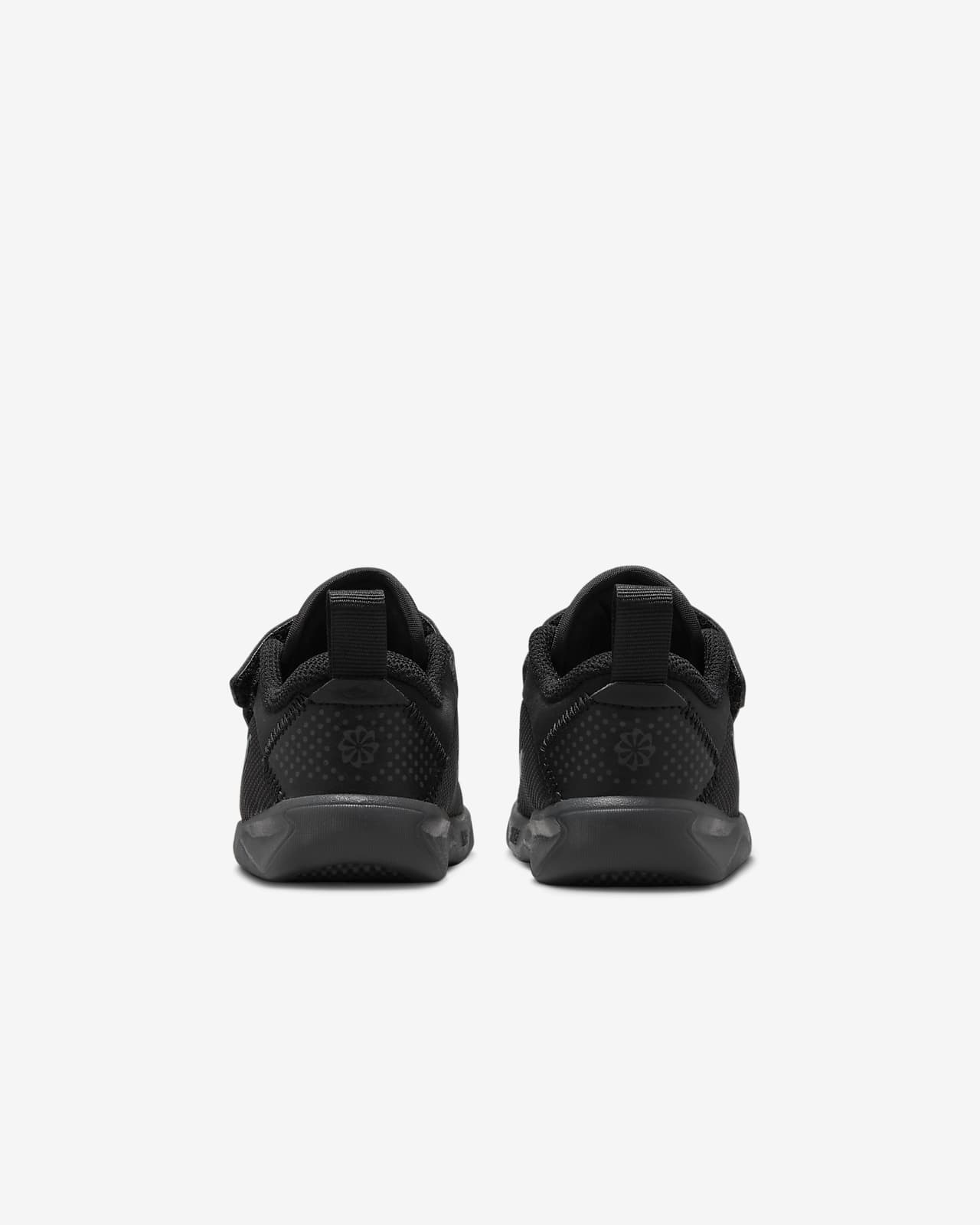 Tenis negros Nike niño plantilla plana