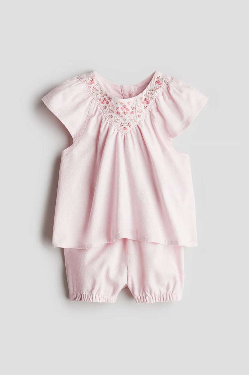 Set conjunto niña rosado floreado H&M