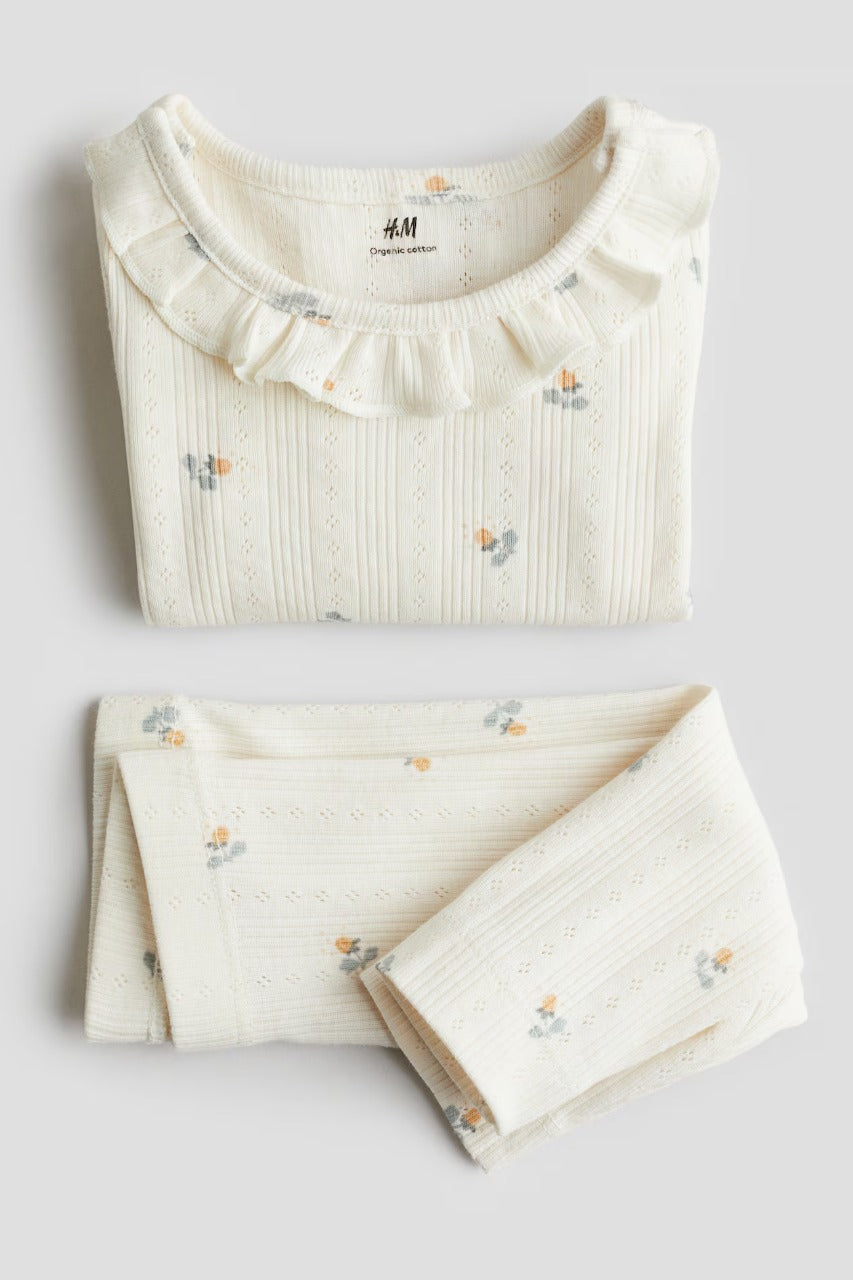 Set 2 piezas mameluco pantalon beige flores bebe niña H&M 1281195