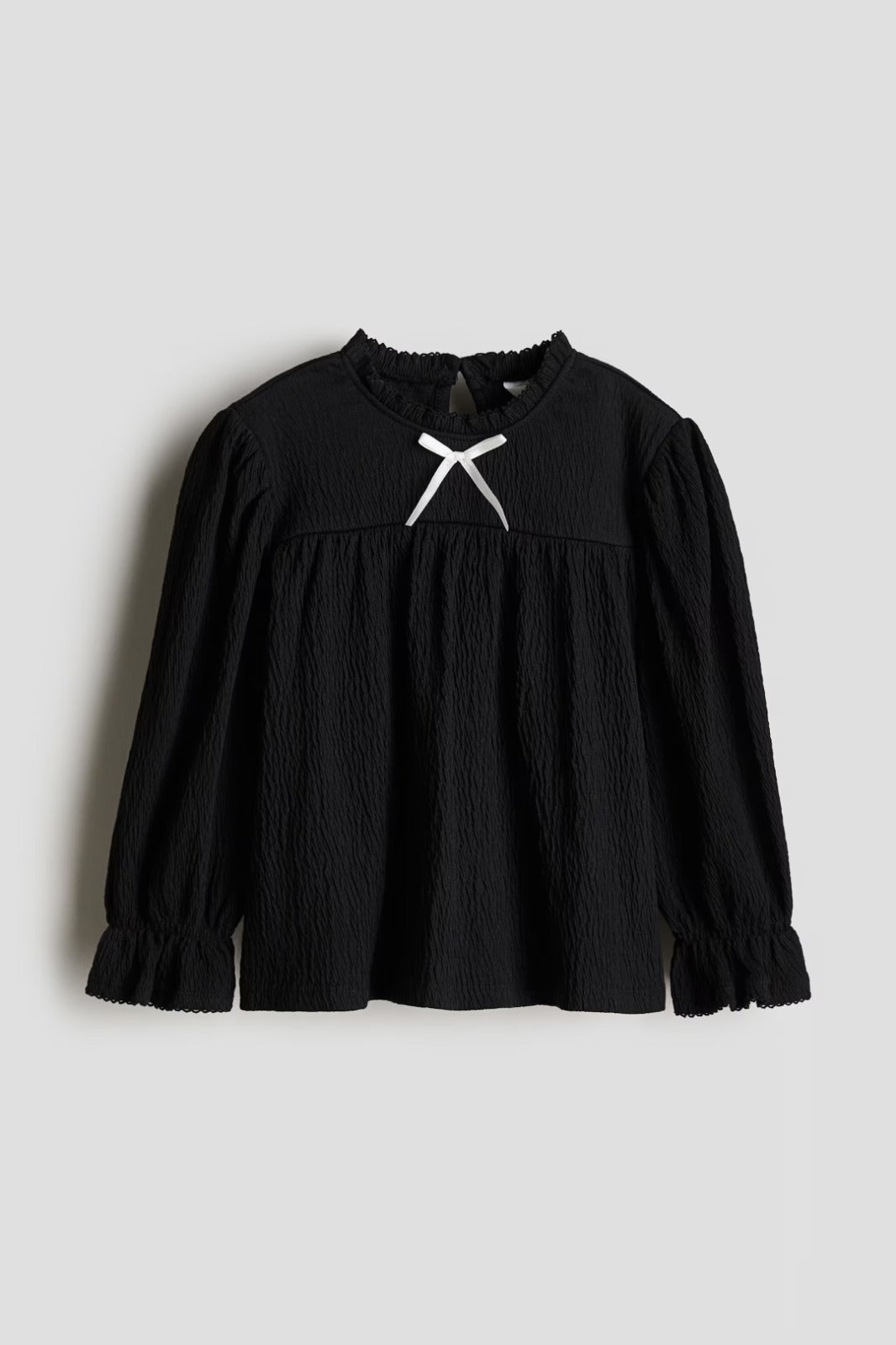 Camisa negra niña chongo H&M 1260561