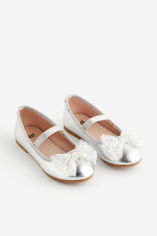 Zapatillas plateadas chongo H&M niña