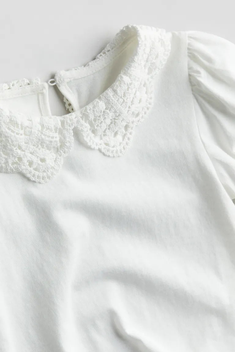 Camisa blanca niña H&M revuelos blusa