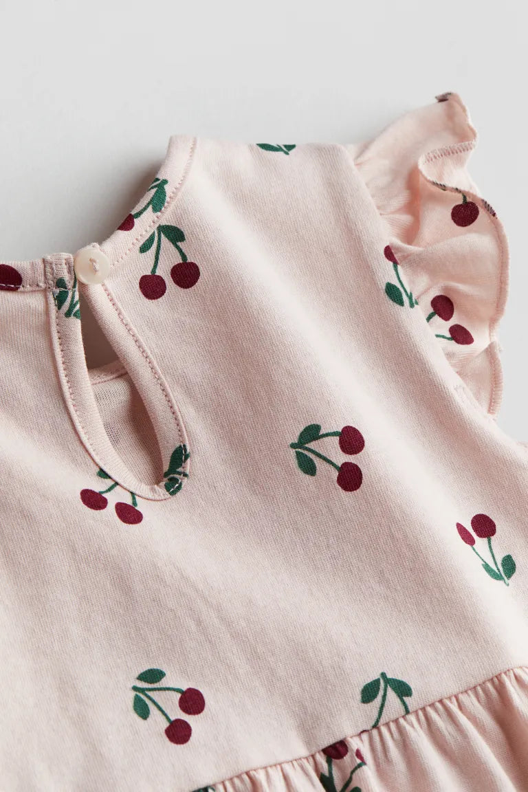 Vestido rosado cerezas revuelos bebe y niña H&M