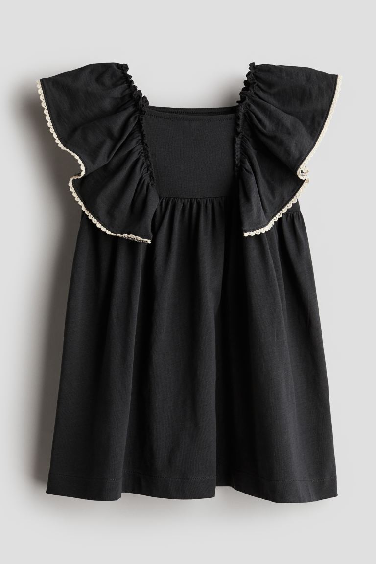 Vestido negro niña H&M revuelos – Kima Shop HN