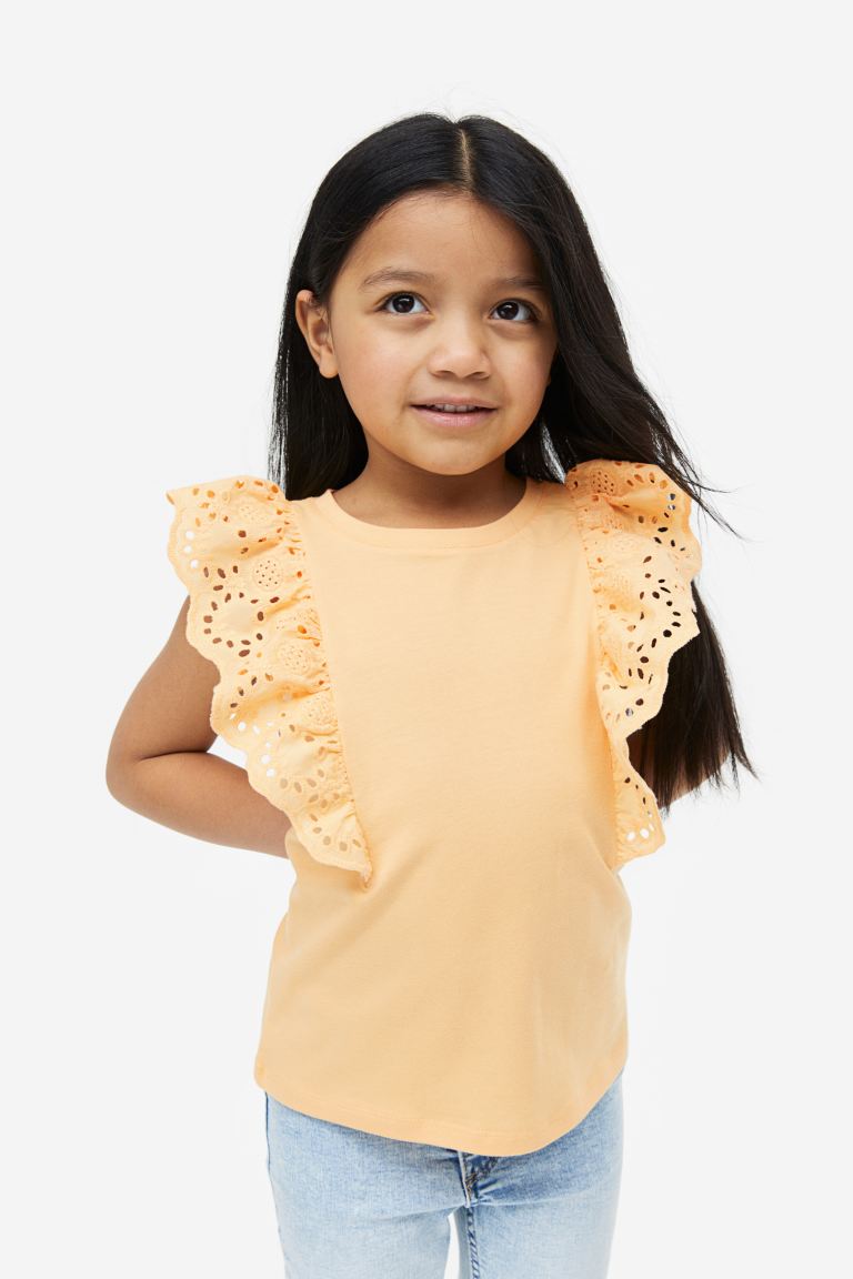 Camisa amarilla niña H&M revuelos blonda eyelet