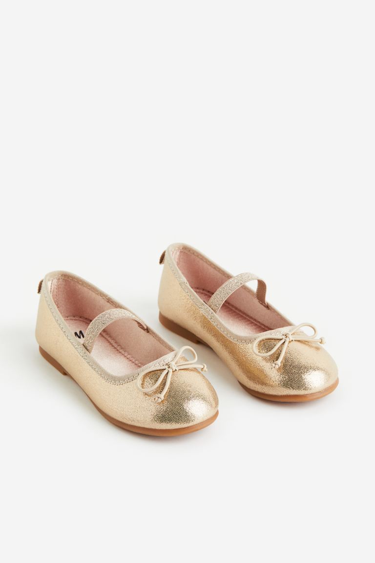 Zapatillas doradas niña – HN