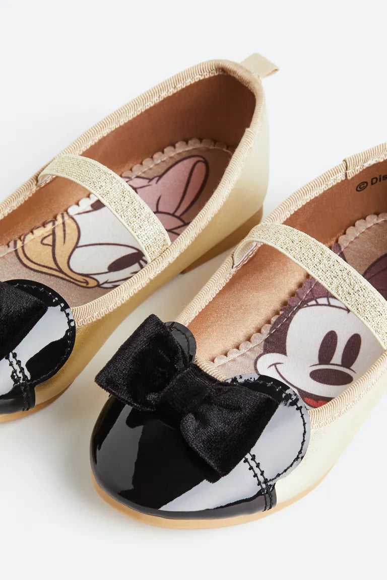 Zapatillas doradas negras H&M niña minnie disney
