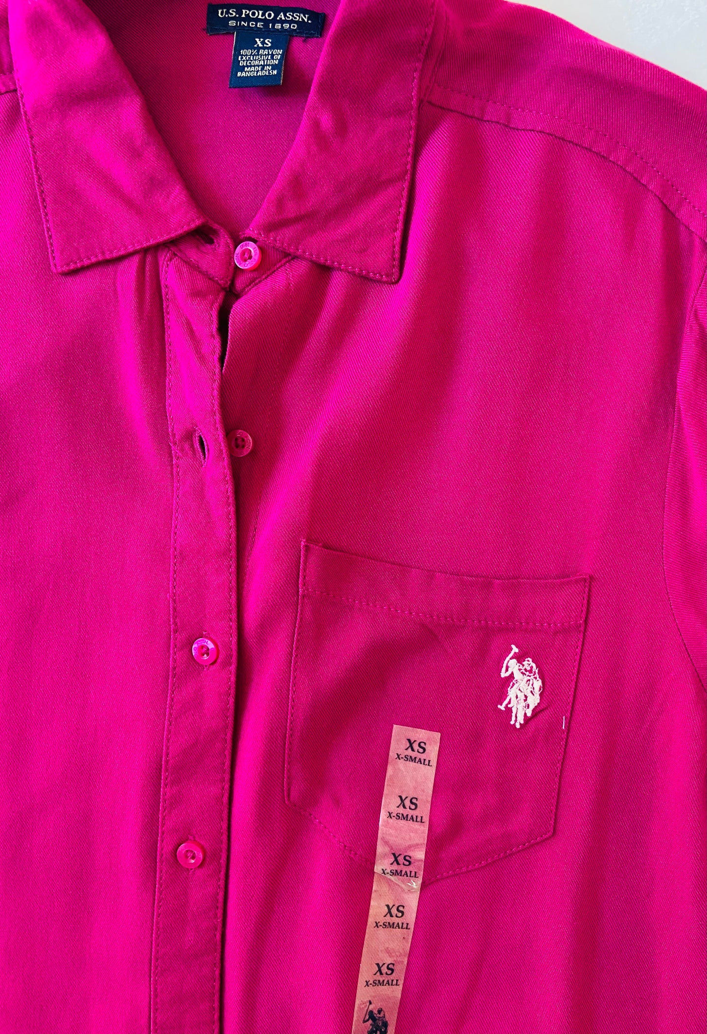 Camisa Polo Mujer rosado fucsia