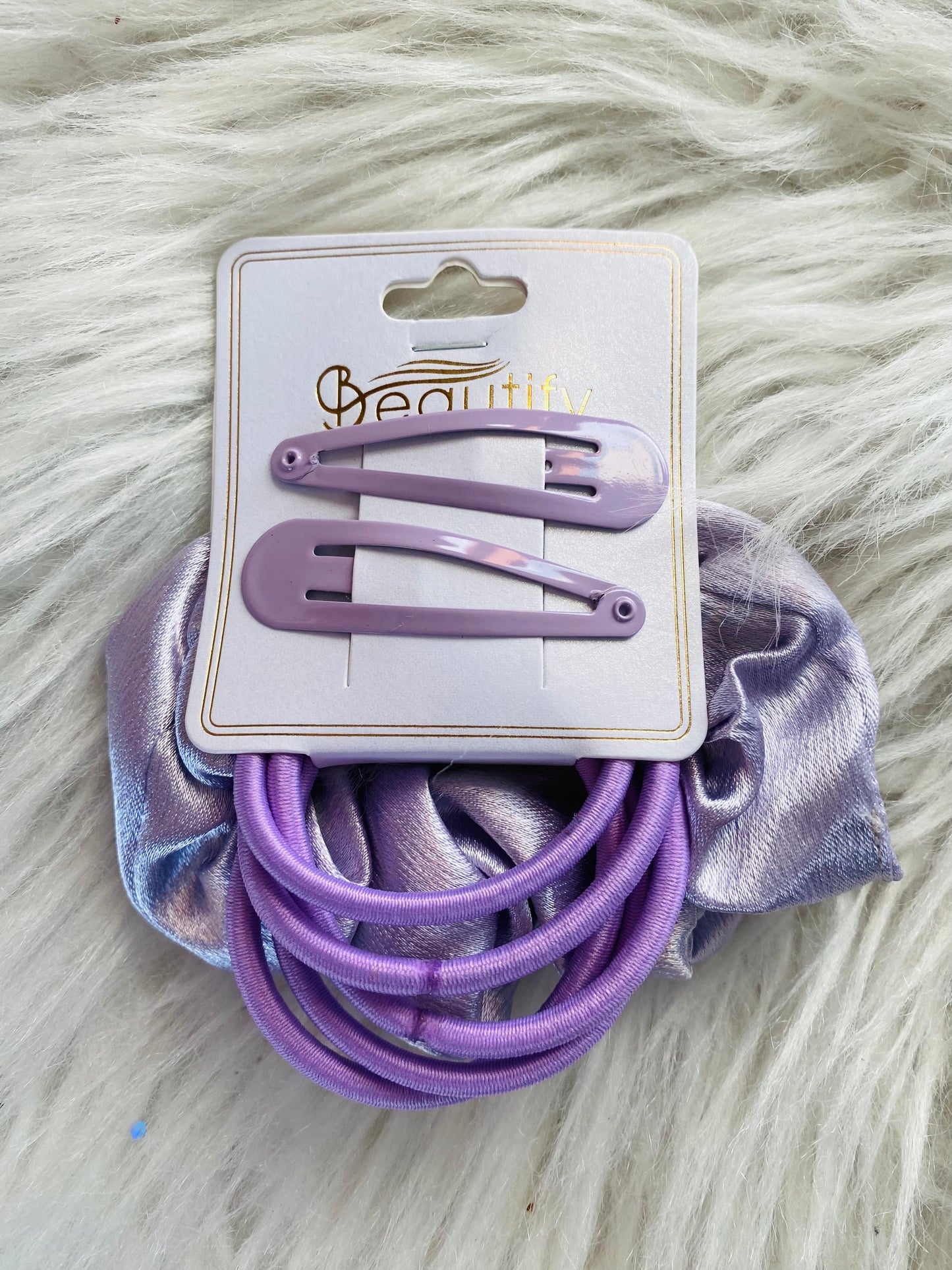 Colas y ganchos morado