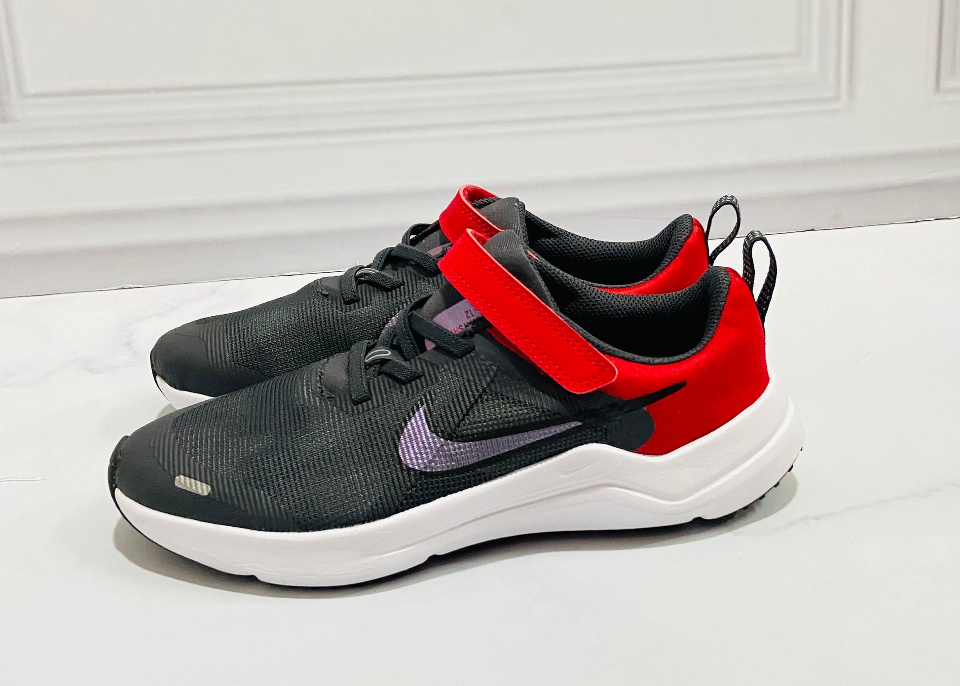 Tenis nike negros para top niño