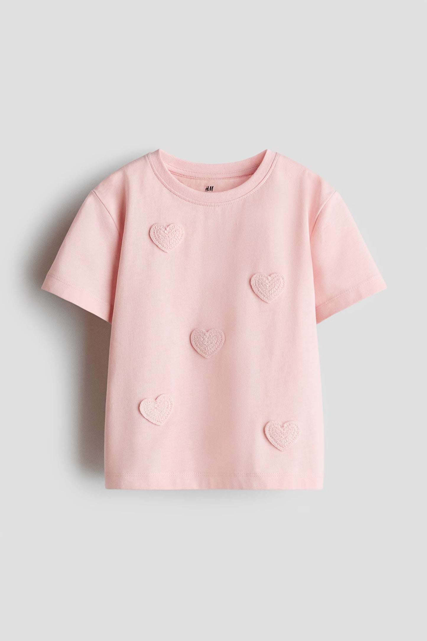 Camisa corazones rosado niña H&M 1302424024