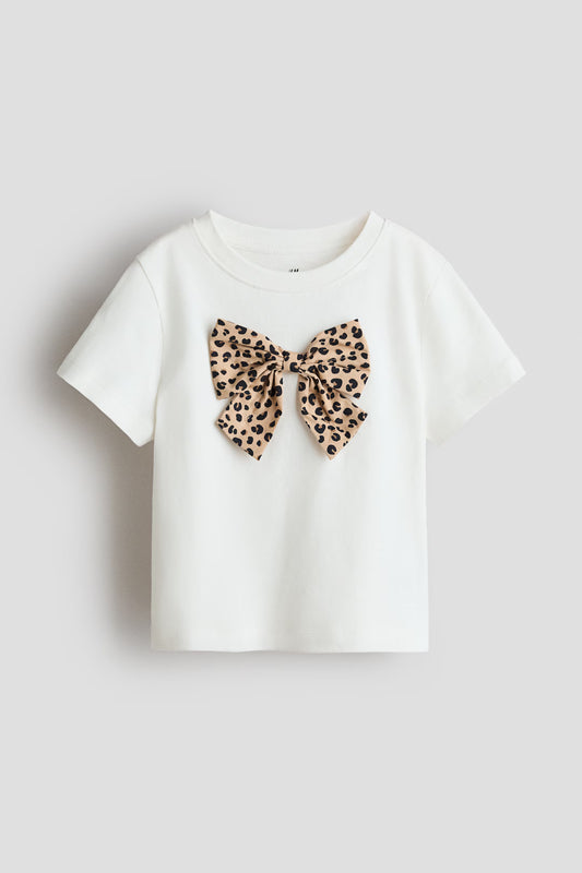 Camisa blanca chongo animal print tigreado niña H&M 1302424027010