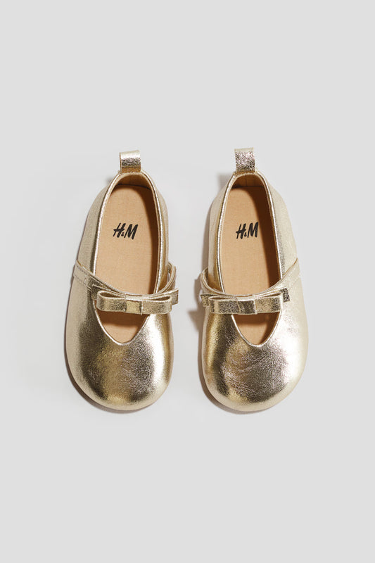 Zapatillas doradas bebe niña H&M 1276482011