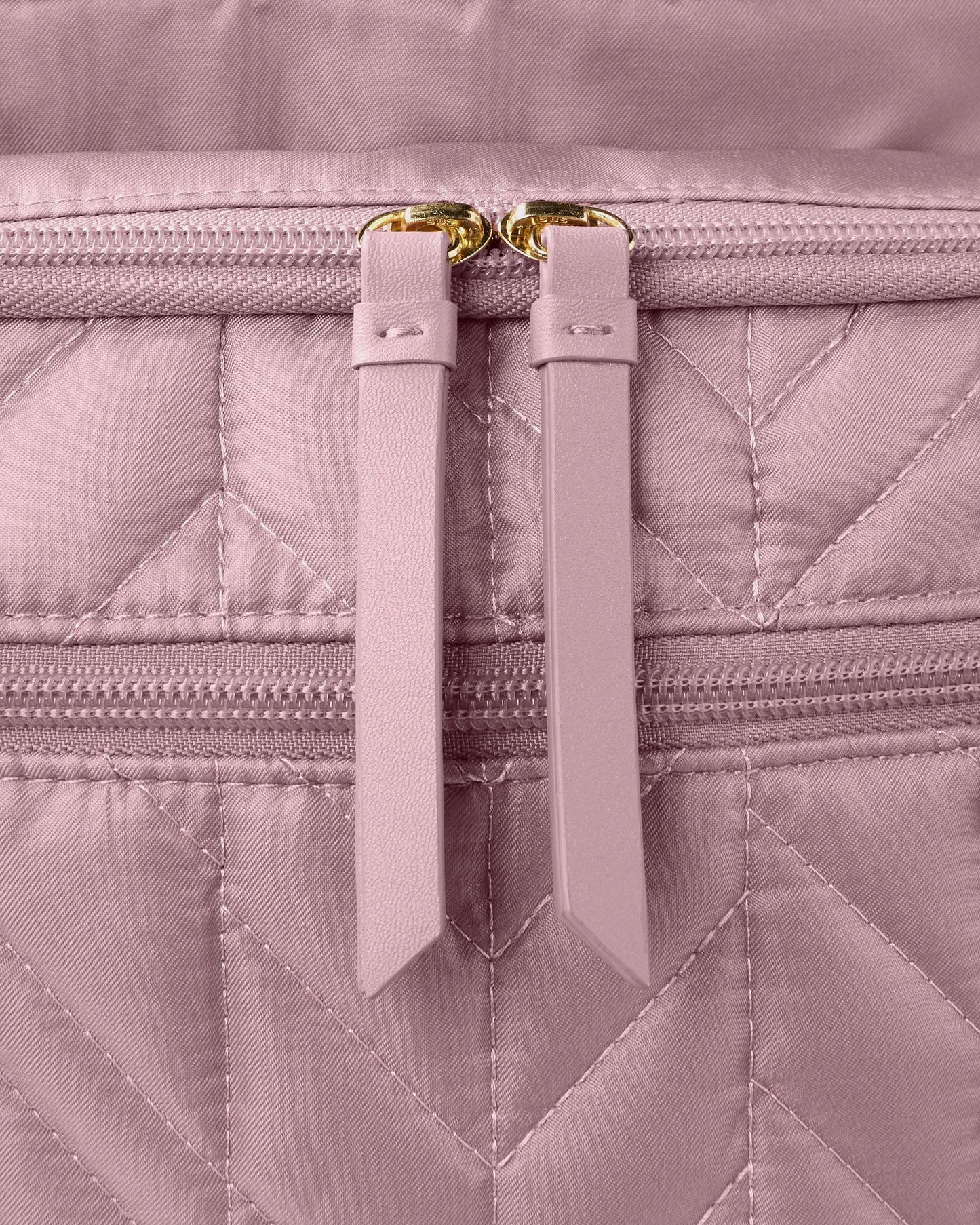 Pañalera bebe niña rosada skipHop