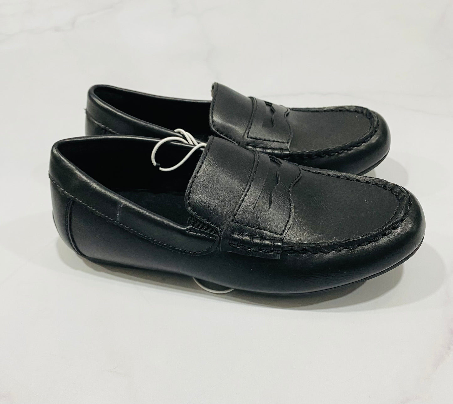 Zapatos Mocasines negros niño rack escolar