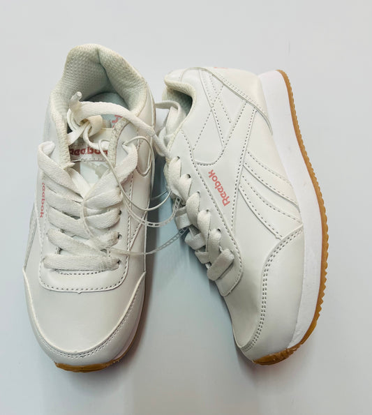 Tenis blancos Reebok letra rosadas