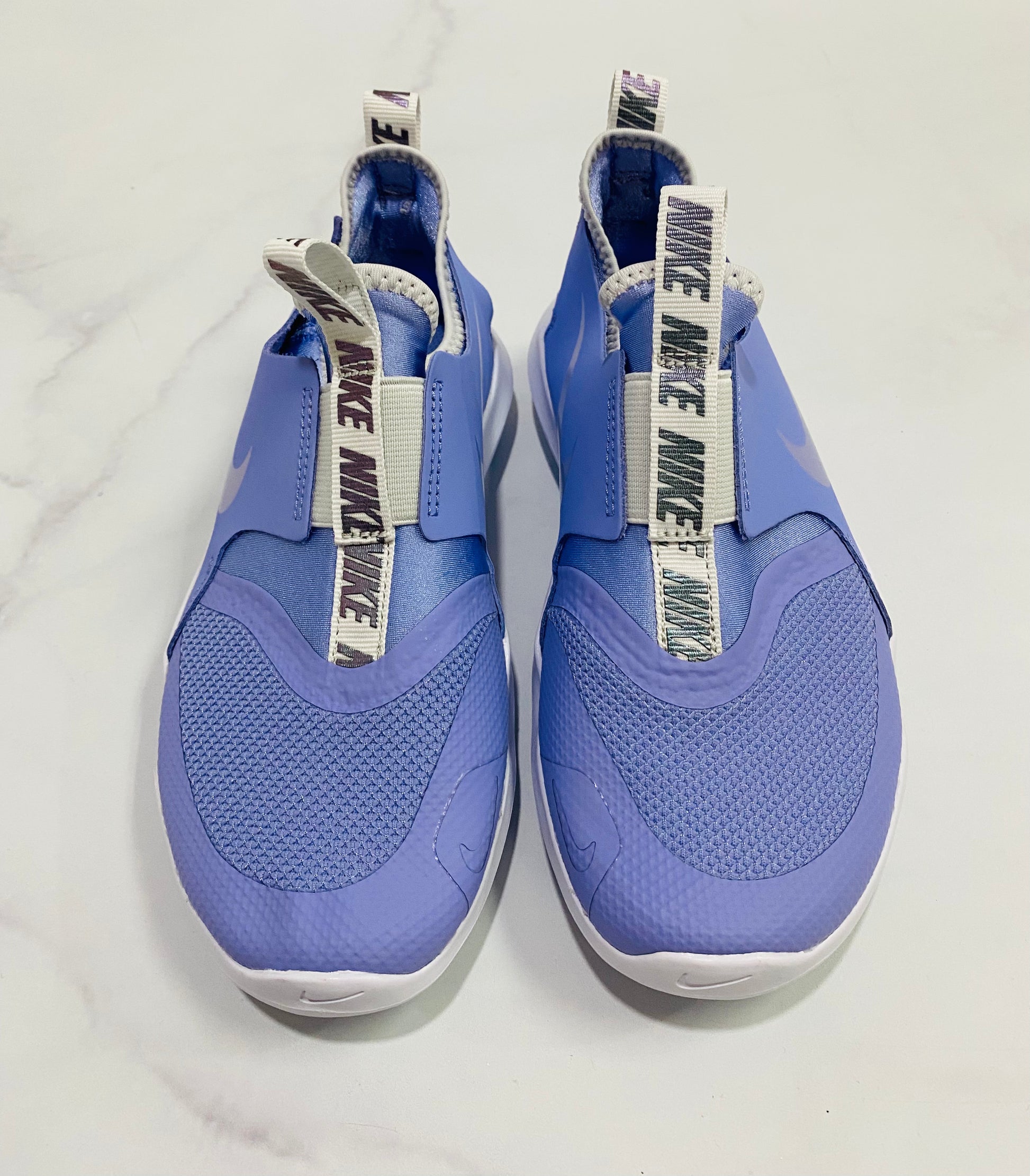 Tenis morados Nike ni a Kima Shop HN