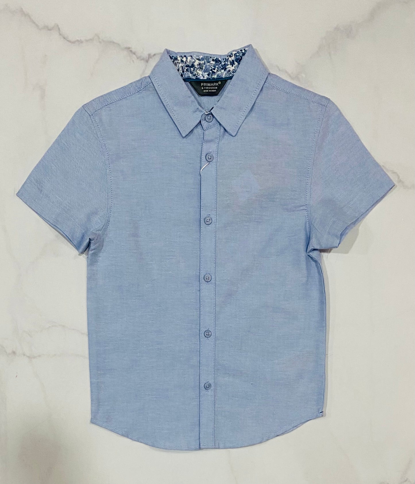 Camisa azul formal Niño primark