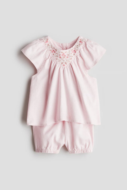 Set conjunto niña rosado floreado H&M