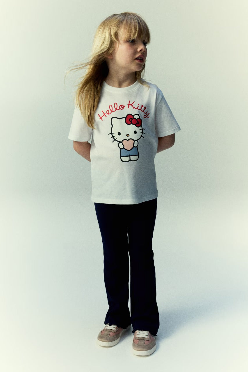 Set conjunto 2 piezas camisa blanca pantalon azul niña Hello Kitty H&M 1300354