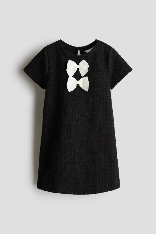 Vestido negro chongo niña H&M 1314454001