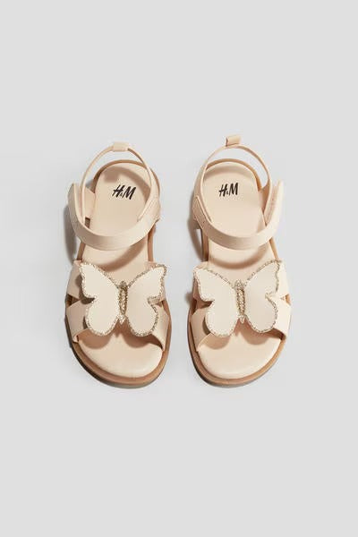 Sandalias doradas mariposa niña H&M