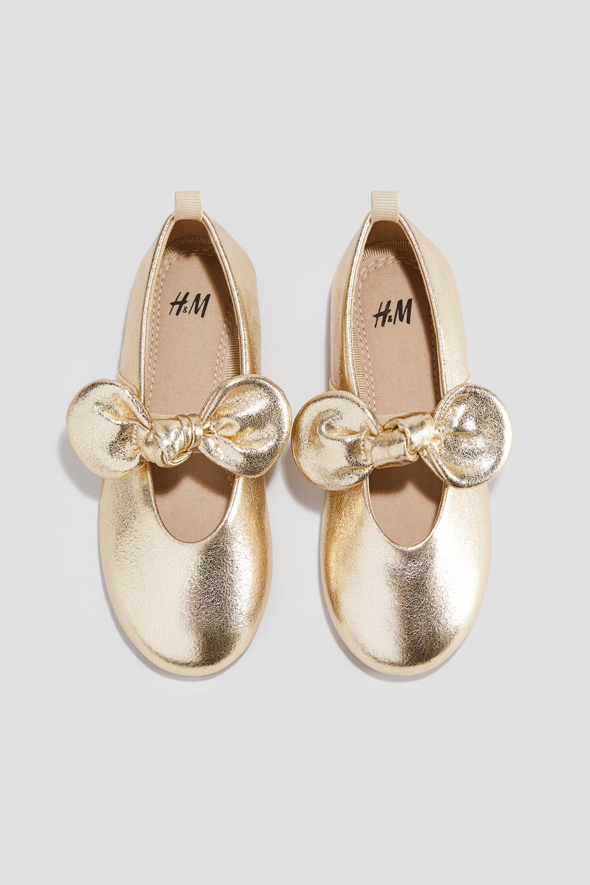 Zapatillas doradas bebe niña chongo H&M 1295112009