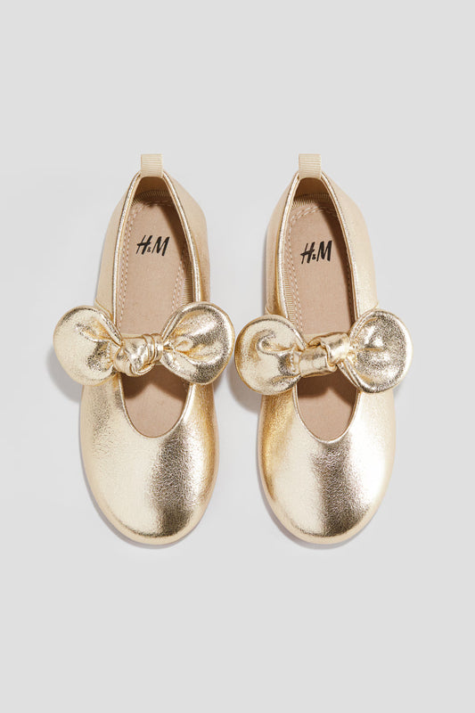 Zapatillas doradas bebe niña chongo H&M 1295112009