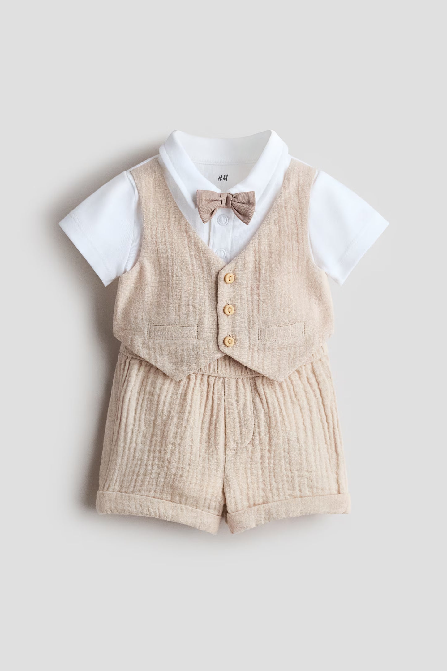 Set conjunto 2 piezas formal short mameluco blanco chaleco beige bebe niño H&M 1332729002