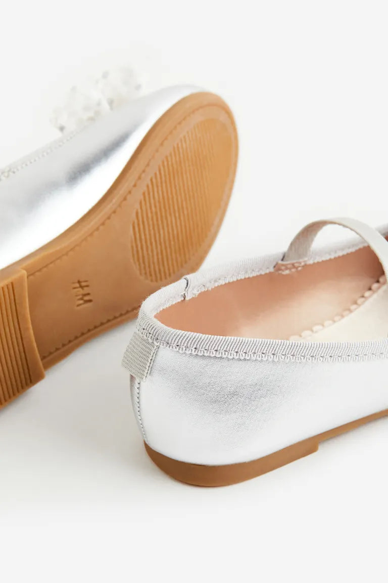 Zapatillas plateadas chongo H&M niña
