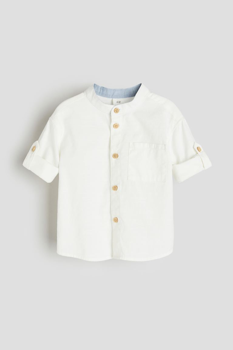 Camisa blanca formal  henley niño H&M formal bolsa afuera