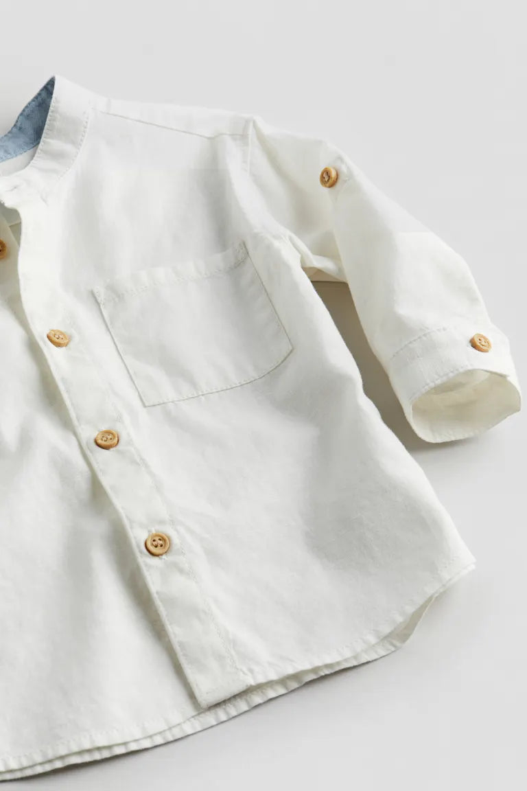 Camisa blanca formal  henley niño H&M formal bolsa afuera