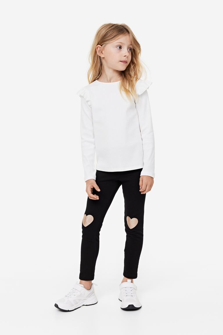 Leggins negra niña H&M corazon love