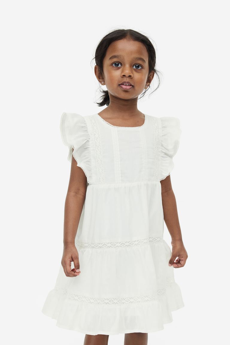 Vestido blanco encaje fino niña H&M 06227440