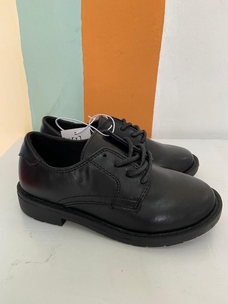 Zapatos negros niño place cintas