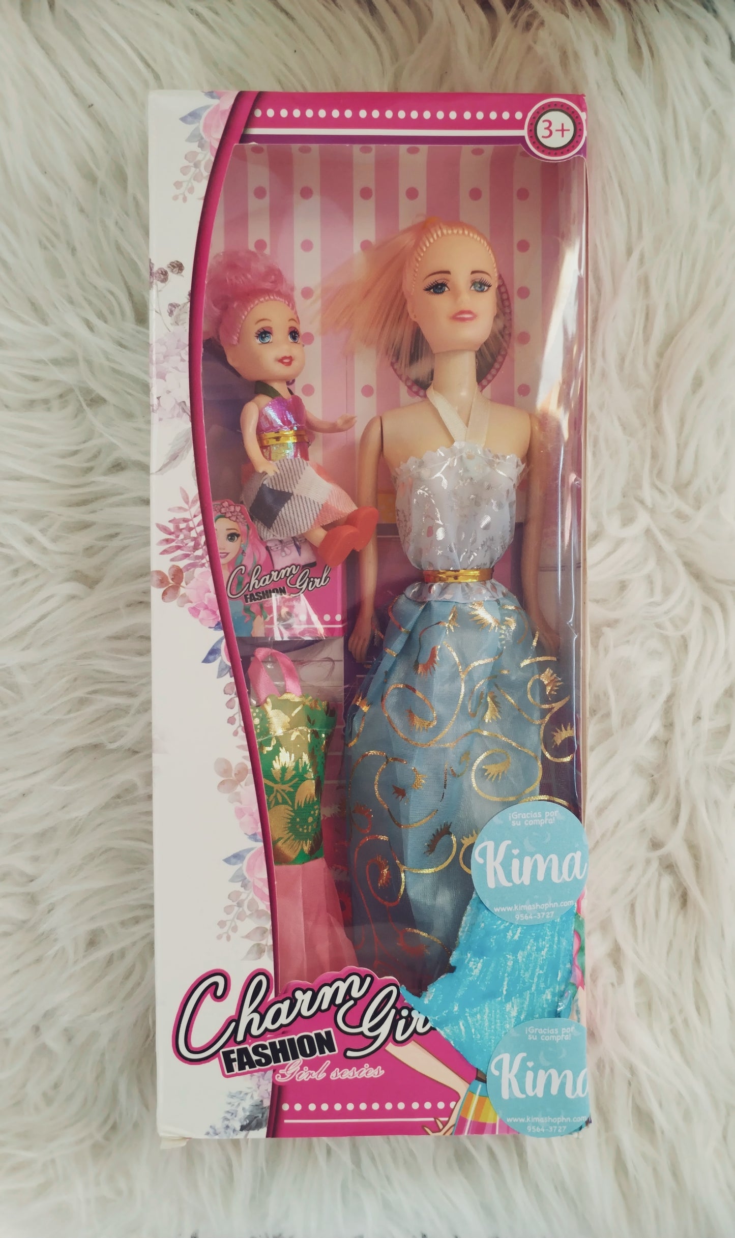 Muñeca con bebé juguete